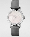 From the Koppel Collection. A dazzling, diamond accented timepiece based on the brand's philosophy to meld design and functionality. Quartz movementWater resistant to 3 ATMRound stainless steel case, 28mm (1.1)Diamond accented bezel, .12 tcwWhite mother-of-pearl dialDot hour markersGrey satin strapMade in Switzerland 