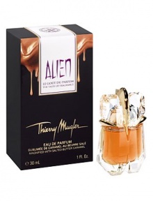 The mysterious notes of Alien are reinvented in a daring collision of luxury fragrance and haute cuisine. Enhanced with salted butter caramel, the illuminating notes of Alien are intensified, making them exhilarating, carnal, and deliciously velvety. Alien Taste of Fragrance is radiantly captured in a crystalline bottle to expose the rich, warm, caramelized juice, and is showcased in a mouth-watering package reminiscent of decadent gourmet sweets. 1 oz.