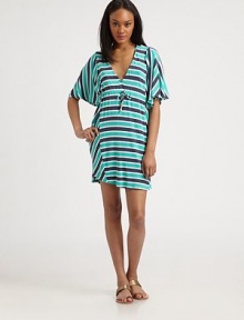 Vibrant stripes on stretch jersey, all in an easy cinched-waist shift.V necklineShort sleevesDrawstring waistAbout 15 from natural waist96% rayon/4% spandexDry cleanMade in USAModel shown is 5'9 (175cm) wearing US size Small.