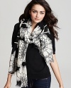 Add a hint of elegance to any outfit with this black and cream Japanese floral scarf by kate spade.