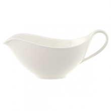 Anmut will be the choice for purists; it is an undecorated white that beautifully shows off the glamorous forms and quality bone china. Dishwasher and microwave safe. Accessories shown: oval platter, round vegetable bowl, creamer, sugar bowl.