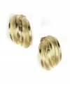 Sweet simplicity in clip-on style. Jones New York earrings feature a clip-on backing with a chic swirl design. Crafted in gold tone mixed metal. Approximate drop: 1 inch.