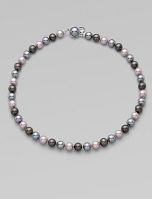 A beautiful multi-color piece with a mabe clasp closure. 8mm organic man-made round grey, nuage and Tahitian pearlsLength, about 18Mabe clasp closure Imported 