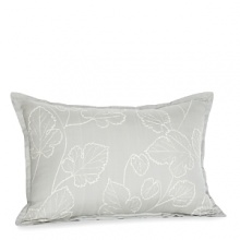 Dress up the bed with this dainty decorative pillow. With a subdued color and floral print, it makes a lovely addition to your home.