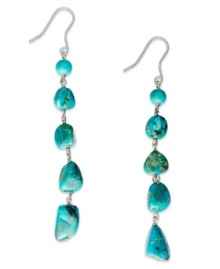 Add a touch of turquoise with colorful gemstones. Avalonia Road's long earrings feature turquoise stones (7-5/8 ct. t.w.) in sterling silver. Approximate drop: 3-3/4 inches.