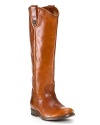 Sleek western style pull-on leather boots with button tab detail at top. Buttons decorate both sides with small logo detail. Round toe and 1 stacked heel. Leather lining and leather sole.