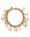 Designed to charm, Carolee's pearl and gold-plated bracelet is a classic accessory that lands an easy elegance to any outfit.