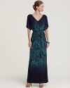 Infused with a ravishing print, this Trina Turk maxi dress in billowing silk is ideal for effortless day-to-night wear.