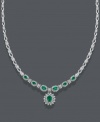 Take your evening wear from drab to dramatic with this lovely necklace by Effy Collection. A polished 14k white gold setting features oval-cut emeralds (17-7/8 ct. t.w.) surrounded by dazzling round-cut diamonds (2-1/3 ct. t.w.). Approximate length: 17 inches. Approximate drop: 1 inch.