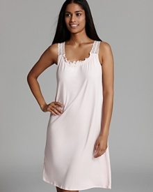 Hanro does the breezy nightgown in a delicate hue with lace straps and a ruffle neckline.