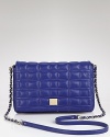 Delight in the luxurious look of this elegant quilted bag from kate spade new york. Ideally sized for desk-to-dinner demands, it flaunts a versatile shape in rich leather.