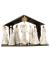 Each piece beautifully crafted of pure white porcelain, this glowing nativity scene depicts the birth of Baby Jesus with Mary, Joseph and the divine angel watching over them. Embellished with gold details.