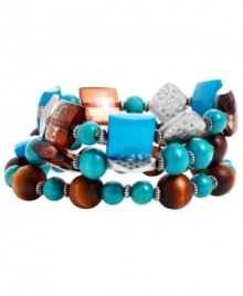 Funky, chunky and fun. Playful shapes and bright colors adorn Haskell's three bracelet set. Crafted in silver-plated mixed metal with faceted turquoise acrylic and wooden beads. Bracelets stretch to fit wrist. Approximate length: 7-1/2 inches.