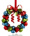 It has a ring to it. A wreath crafted of red, green and gold jingle bells fills your tree with irresistible merriment.