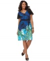 A mixed paisley print beautifully illuminates Elementz' short sleeve plus size dress, finished by a belted waist-- wow them at work! (Clearance)