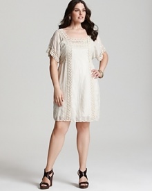 Lush lace trims the relaxed silhouette of this Johnny Was dress, imparting a vintage feel to your look.