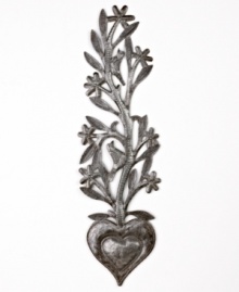 So much to love. Haiti's resourceful artisans cut and carve recycled steel into one-of-a-kind wall art that also functions as a jewelry tree. Hang and admire it on the bathroom or bedroom wall, then fill its branches with bracelets, pendants and more.