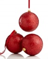 Prepare to be dazzled. Glittery red ball ornaments crafted of shatterproof glass guarantee a tree that's always merry and bright. From Kurt Adler.