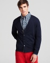 Bring a fashionable preppy edge to your fall looks with this Jack Spade cardigan in plush merino wool.