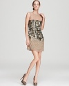 Silk chiffon mingles with sparkling sequins on this ABS by Allen Schwartz dress.