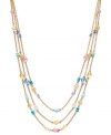 A multitude of hues makes for instant style pick-me-up! Lauren by Ralph Lauren's colorful three row necklace features reconstituted semi-precious turquoise and glass beads strung from delicate chains. Set in gold tone mixed metal with a lobster claw clasp. Approximate lengths: 18, 19 and 20 inches + 2-inch extender.