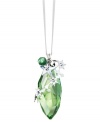 Green to envy. The cone-shaped Peridot Silver Shade ornament sparkles in faceted Swarovski crystal with elaborate silvertone accents. Delicate, dangling charms – including a real metal bell – add extra dazzle.