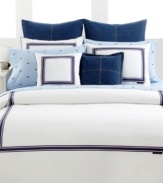 Classic style, totally Tommy. Boasting pure white cotton embellished with navy, white and red striping, the White Oxford duvet cover gives your bed a polished look with a preppy edge. Featuring a striped reverse; mitered corner stitching; button closure.