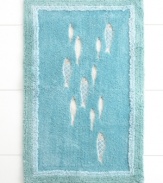 There are plenty of fish in the sea. Swim into a serene beach haven with this Nantucket bath rug, featuring enchanting silver fish on a cool blue backdrop for a soothing presentation.