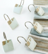 Bring the memories of a beachside vacation into your bathroom with this By the Sea bath collection. Shower curtain hooks are a bath essential. Crafted in glossy metal.