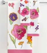 Blossoms in bloom. Bold, impressionistic florals in a fusion of dazzling colors creates a modern flair in this Floral Fusion hand towel.