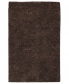 Step onto a cloud-soft area rug in chocolate brown wool. Offering one of the thickest, plushest hands in the industry, the Surya Metropolitan area rug billows with softness in every space.