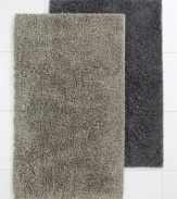 Comfort gets a new look of sophistication with Hotel Collection's Twisted bath rug, featuring soft, thirsty twists of pure cotton and a secure non-skid backing.