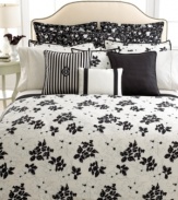 Finish your bed in stylish grace with this Port Palace bedskirt from Lauren by Ralph Lauren, featuring a white floral design on a black ground.