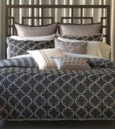 Undeniably modern, the Bryan Keith Portland reversible comforter set offers two sophisticated patterns for a multitude of mix and match possibilities. One side of the comforter and shams feature bold stripes while the other boasts interlocking rings. Ribbed European shams and striking decorative pillows finish the look in style. (Clearance)