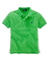 A short-sleeved polo shirt is cut in soft breathable cotton mesh.