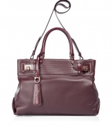 Luxurious bag in rich oxblood leather - Extremely high quality craftsmanship you can absolutely see - Stylish, roomy satchel (shopper) shape with one short carry handle and a long shoulder strap - Classy, gold-colored turn-key closures - Accent stitching adds a modern cool - A fantastic upgrade for simple  business and daytime looks