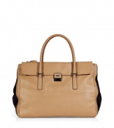 Tote around your daily essentials in style with this luxe neutral shopper from cult favorite Anya Hindmarch - Rectangular shape, carrying handles, front flap with logo detailed closure, contrasting black side detail - Perfect for daily use or for casual cocktails with the girls