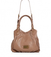 Marc by Marc Jacobs gives the classic shopper tote a sleek, streamlined redux in praline-hued leather - Large carryall shape, double top handles and convertible shoulder strap, logo plaque detail, top cinch strap, magnetic top snap, inside zippered back wall pocket, front wall slot pockets - An easy and chic choice for work, school, or weekend shopping