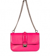 Glamorize every look with Valentinos bright pink leather shoulder bag, detailed with tonal oversized rockstuds and a chain-link strap for that impossibly ladylike feel - Push-stud closure, removable chain shoulder strap, inside zippered back wall pocket - Carry as a pretty polish to cocktail dresses or tailored separates