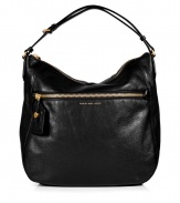 Detailed in textural black leather with a practical oversized shape, Marc by Marc Jacobs hobo bag lends a cool Downtown edge to every outfit - Zippered front pocket with luggage tag, metallic embossed logo, double top handles, removable belted shoulder strap, zippered top, inside zippered back wall pocket, 2 front wall slot pockets - Sling over your shoulder for work, school, or weekend shopping