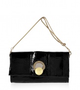 Perfect for carrying with festive cocktail frocks, Diane von Furstenbergs black snakeskin clutch is a contemporary choice packed with luxe appeal - Flap with mixed metal magnetic logo engraved circle clasp, removable gold-toned chain strap, inside zippered back wall pocket - Team everything from cocktail dresses and flats to evening gowns and statement heels