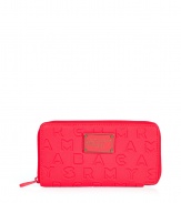 Detailed in durable neoprene with an allover logo print, Marc by Marc Jacobs zip-around wallet is a fun and covetable choice for stashing away your everyday essentials - Tonal logo plaque, zip-around closure, zippered change purse, multiple credit card slots - Carry alone for running quick errands, or slip into a brightly printed handbag