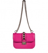 Glamorize every look with Valentinos bright pink leather shoulder bag, detailed with oversized rockstuds and a chain-link strap for that impossibly ladylike feel - Push-stud closure, removable chain shoulder strap, inside zippered back wall pocket - Carry as a pretty polish to cocktail dresses or tailored separates