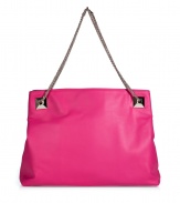 Glamorize every look with Valentinos bright pink leather shoulder bag, detailed with oversized rockstuds and a chain-link strap for that impossibly ladylike feel - Embossed logo, removable chain shoulder strap with oversized rockstuds at base, two inside sections, zippered middle sectional pocket, zippered back wall pocket, two front wall slot pockets, protective feet - Carry as a pretty polish to day and evening looks alike