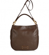 The classic hobo gets a modern redux with this supple leather version from Marc by Marc Jacobs - Classic hobo shape, magnet closure, top carrying handle, convertible shoulder strap, front logo plaque - Wear with an elevated jeans-and-tee ensemble or with a casual cocktail look