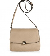 With its elegant nude hue and covetable rockstud closure, Valentinos accordion-style shoulder bag counts as a multi-season must - Flap-over, buckled shoulder strap, three internal sections, inside zippered back wall pocket - Lends an iconic polish to leather leggings and chic tailored sheaths alike