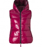 Sporty and sleek, this slim down vest from Duvetica is a cold weather must-have - Hood with decorative zipper trim, dual-zip front closure, sleeveless, zip pockets, quilted - Slim fit - Wear with an oversized pullover, leather leggings or skinny jeans, and booties