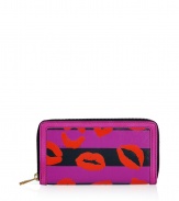 Detailed with a mash-up of bold graphic prints, Marc by Marc Jacobs stripey lips wallet is a fun choice for stashing away your everyday essentials - Metal zip-around closure, zippered change purse, multiple credit card slots, leather trim - Carry alone for running quick errands, or slip into a bright monochrome handbag