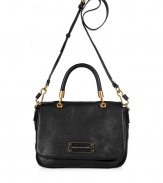 Undeniably chic, this classic convertible bag from Marc by Marc Jacobs exudes ladylike style - Front flap closure with logo plaque, top carrying handle with gold-toned hardware, convertible shoulder strap, textured leather - Perfect for your casual-cool looks or off-duty chic