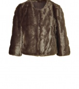 Tap into one of the seasons hottest tactile trends in animal-friendly style with DKNYs taupe faux fur jacket  - Shorter, slightly boxier cut - Open style, with long sleeves and round neck - Polished and ultra-chic, perfect for parties and evenings out - Pair with a cocktail dress and pumps, or with leather pants and ankle booties